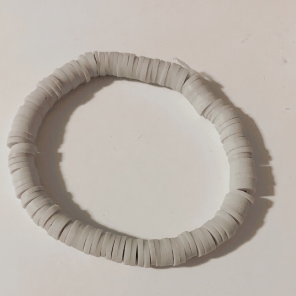 I’m selling a gray clay bead bracelet that I have made